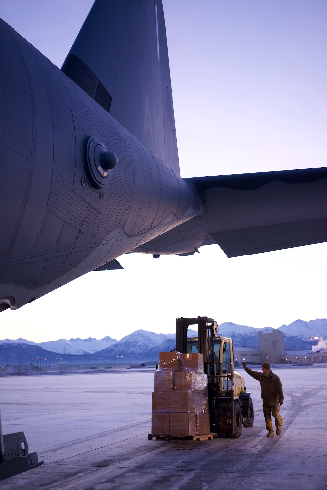 Airmen of 176th Wing load boxes containing prescription drugs onto a 211th Rescue Squadron HC-130J Combat King II Nov. 6, 2018, at Joint Base Elmendorf-Richardson, Alaska, for transport to Spokane, Washington, for incineration. Airmen of 176th Wing, members of the Alaska National Guard Counterdrug Support Program, and special agents of the Drug Enforcement Administration joined forces in the effort of transporting more than 4,000 pounds of prescription drugs turned in during Alaska’s biannual prescription drug take back. (U.S. Air National Guard photo by David Bedard/Released)