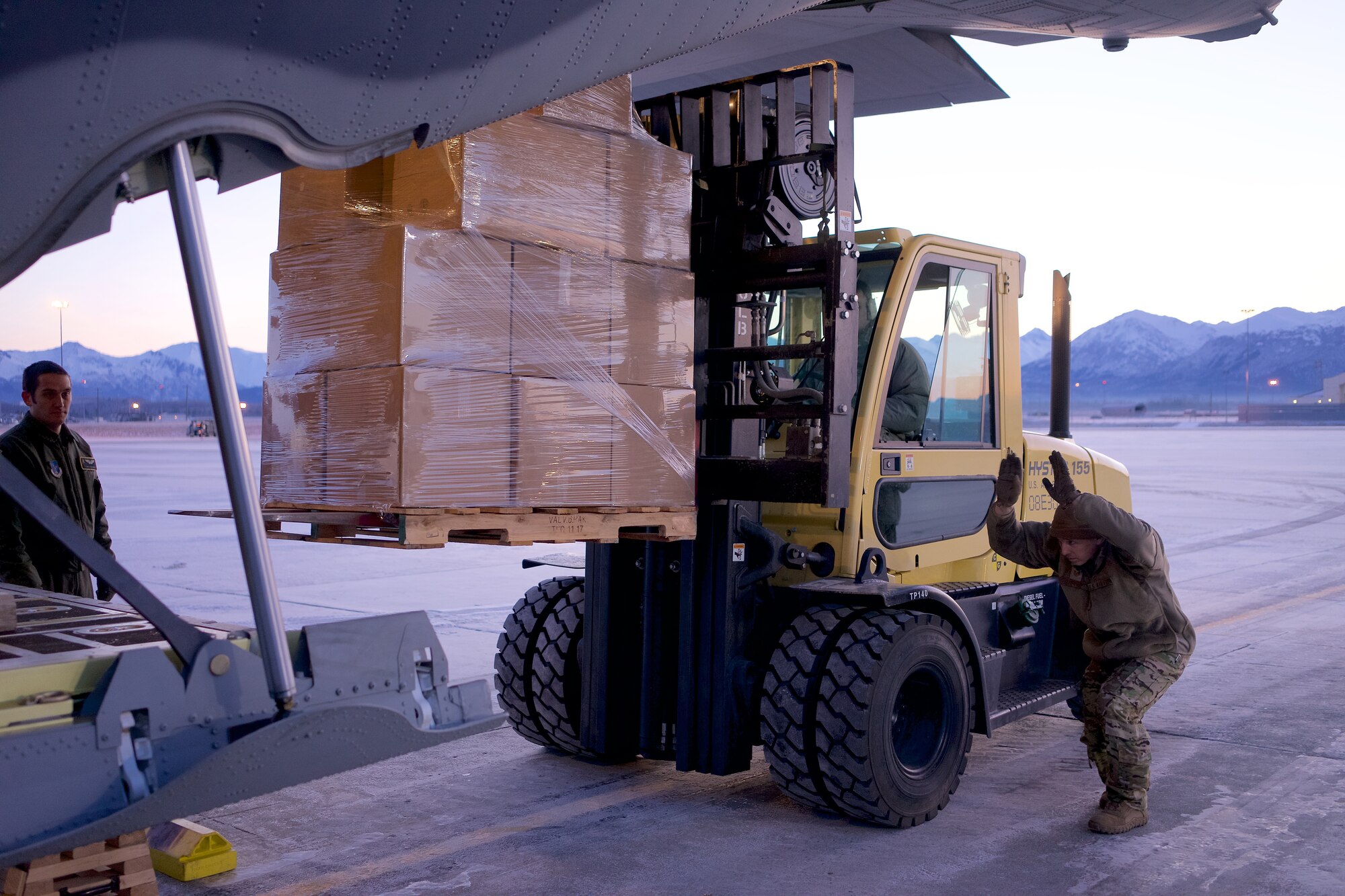 Airmen of 176th Wing load boxes containing prescription drugs onto a 211th Rescue Squadron HC-130J Combat King II Nov. 6, 2018, at Joint Base Elmendorf-Richardson, Alaska, for transport to Spokane, Washington, for incineration. Airmen of 176th Wing, members of the Alaska National Guard Counterdrug Support Program, and special agents of the Drug Enforcement Administration joined forces in the effort of transporting more than 4,000 pounds of prescription drugs turned in during Alaska’s biannual prescription drug take back. (U.S. Air National Guard photo by David Bedard/Released)
