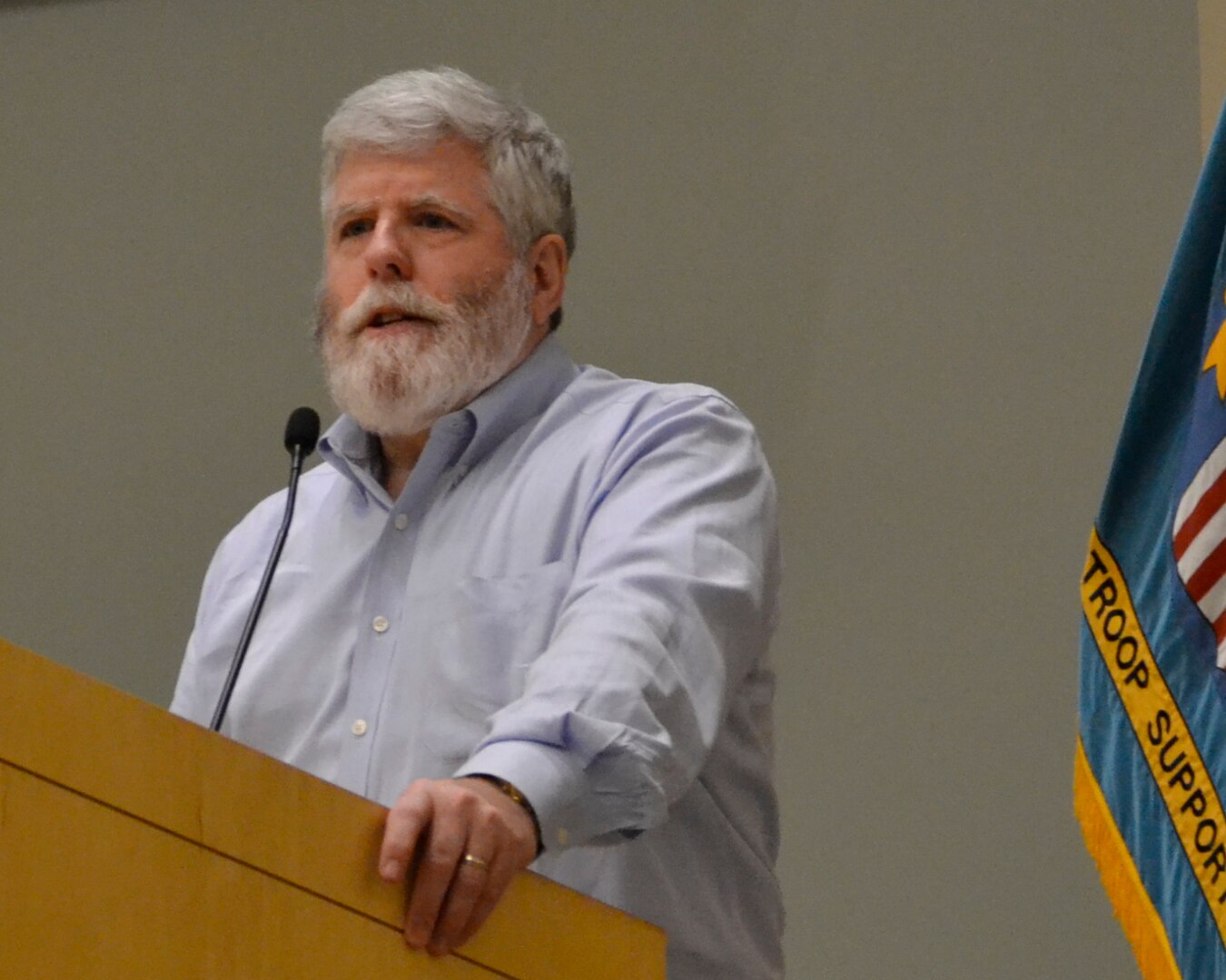 Martin Bollinger, visiting executive lecturer at the Darden Business School and former senior partner with Booz Allen Hamilton, discusses the history of the defense industrial base with DLA Troop Support employees Nov. 20 in Philadelphia, Pennsylvania.