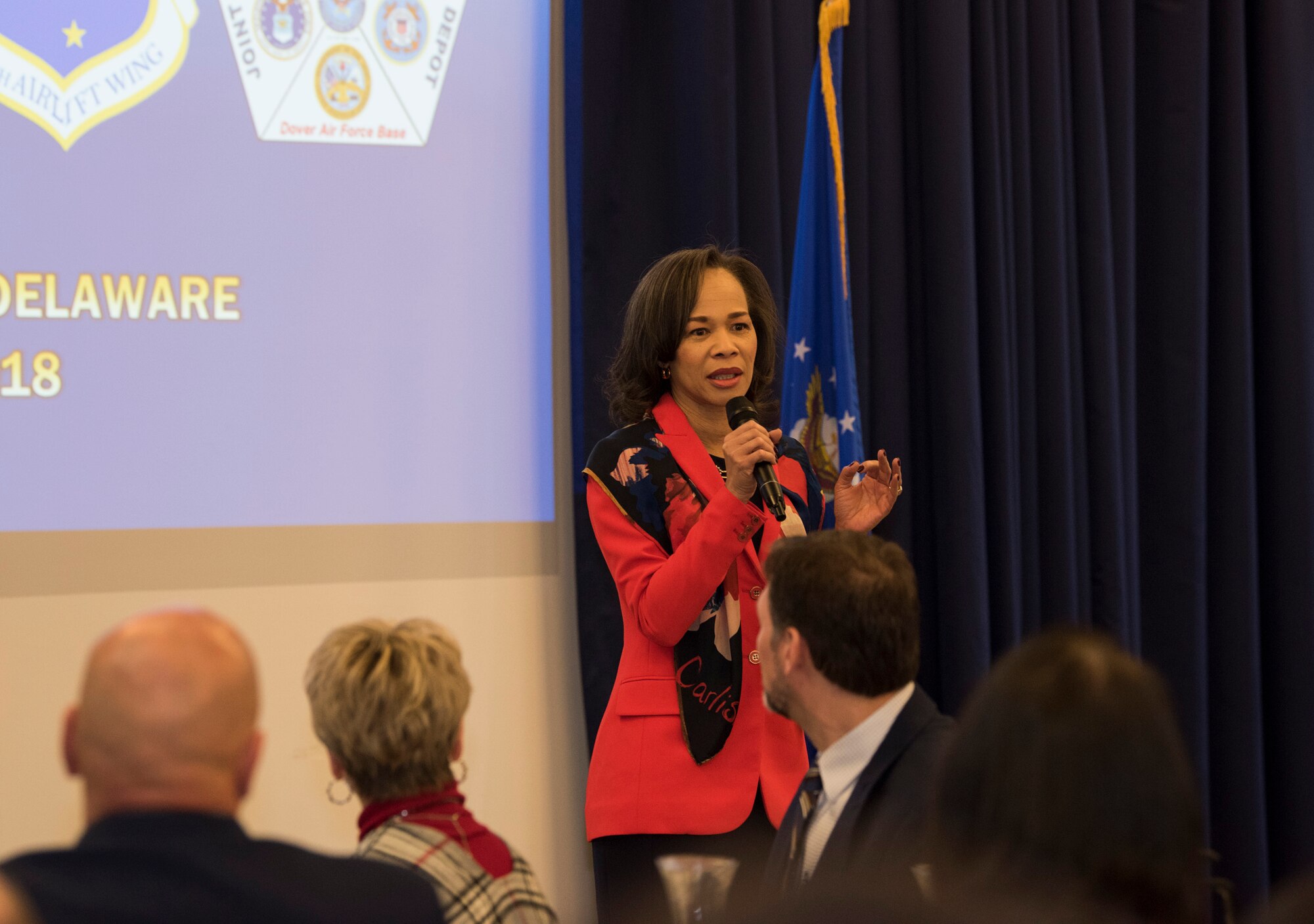 U.S. Rep. Lisa Blunt Rochester of Delaware speaks about state and government unity during the annual State of the Base Nov. 19, 2018, at Dover Air Force Base, Del.  The event was hosted by the Central Delaware Chamber of Commerce and provided an opportunity to  educate and inform community members and leaders on the status and direction of the Air Force and how that affects the Dover community. (U.S. Air Force photo by Airman 1st Class Zoe M. Wockenfuss)