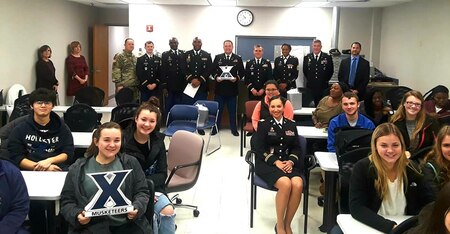 Lt. Col John Ament, 3rd MRB Commander, CSM Syphonia Leggette, and Columbus Recruiting Company talk to students at Xavier University Nursing School in Cincinnati, Ohio on 12 Nov 2018 about Army medical career options.
