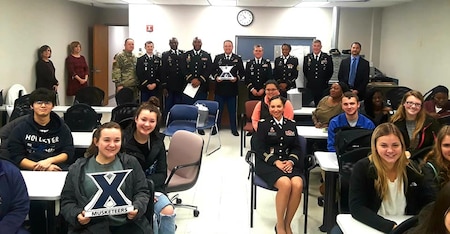 Lt. Col John Ament, 3rd MRB Commander, CSM Syphonia Leggette, and Columbus Recruiting Company talk to students at Xavier University Nursing School in Cincinnati, Ohio on 12 Nov 2018 about Army medical career options.