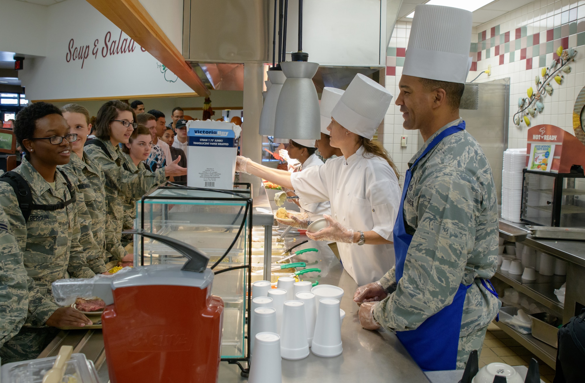 Keesler Air Force Base leadership serves Thanksgiving Day lunch to service members at the Azalea Dining Facility on Keesler Air Force Base, Mississippi, Nov. 22, 2018. It is tradition at Keesler for commanders, first sergeants and superintendents to take time out of their holiday to serve a Thanksgiving meal at the dining facilities to technical training and permanent party Airmen. (U.S. Air Force photo by Andre' Askew)