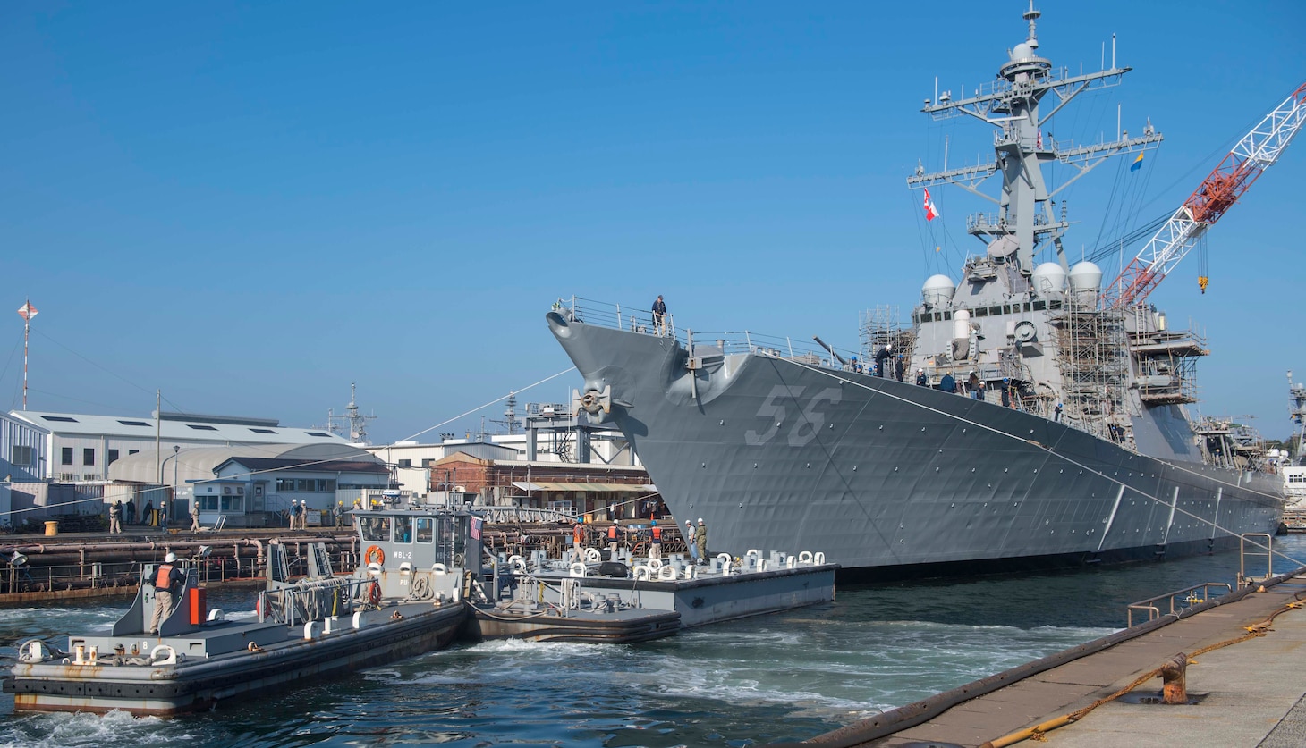 YOKOSUKA, Japan (Nov. 27, 2018) The Arleigh Burke-class guided missile destroyer USS John S. McCain (DDG 56) prepares to depart from a dry dock at Fleet Activities Yokosuka. McCain is departing the dock after an extensive maintenance period in order to sustain the ship's ability to serve as a forward-deployed asset in the U.S. 7th Fleet area of operations.