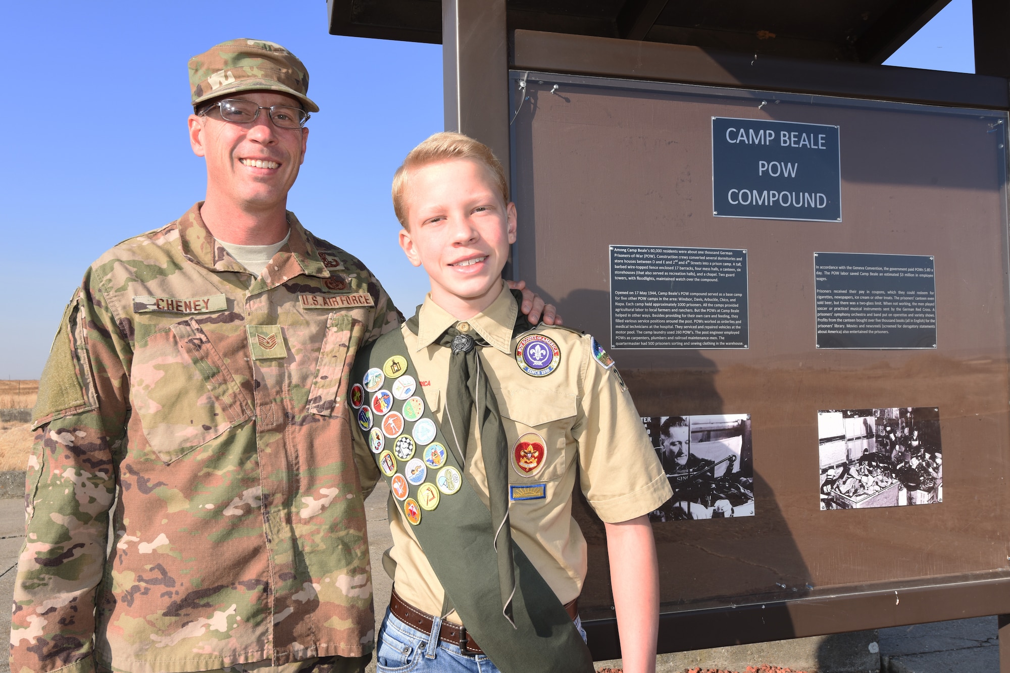 Tech. Sgt. Noah Cheney, an explosive ordinance disposal team leader and Scout Master of Troop 36 in Marysville, poses for a picture with his son Braydon at the POW site on Beale Air Force Base, Calif. Nov 20, 2018.  Braydon organized a renovation of the site for his project that is required a required part of his promotion to Eagle Scout. (Air Force photo by Tech Sgt. Shawn Bryant)