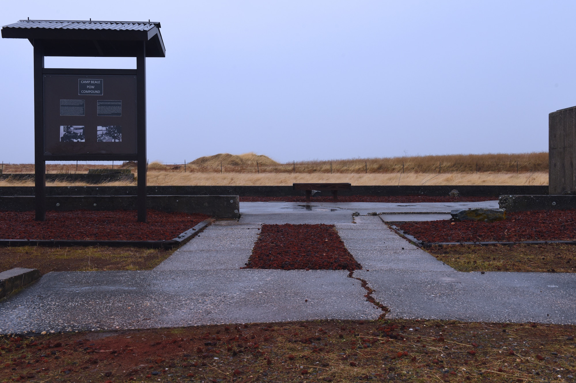 Braydon Cheney, a Boy Scout from Troop 36 in Marysville, worked with the 9th Civil Engineer Squadron to obtain rakes, paint, and rock in order to restore the POW site.  Completing this project brings him one step closer to becoming an Eagle Scout. (Air Force photo by Tech Sgt. Shawn Bryant)