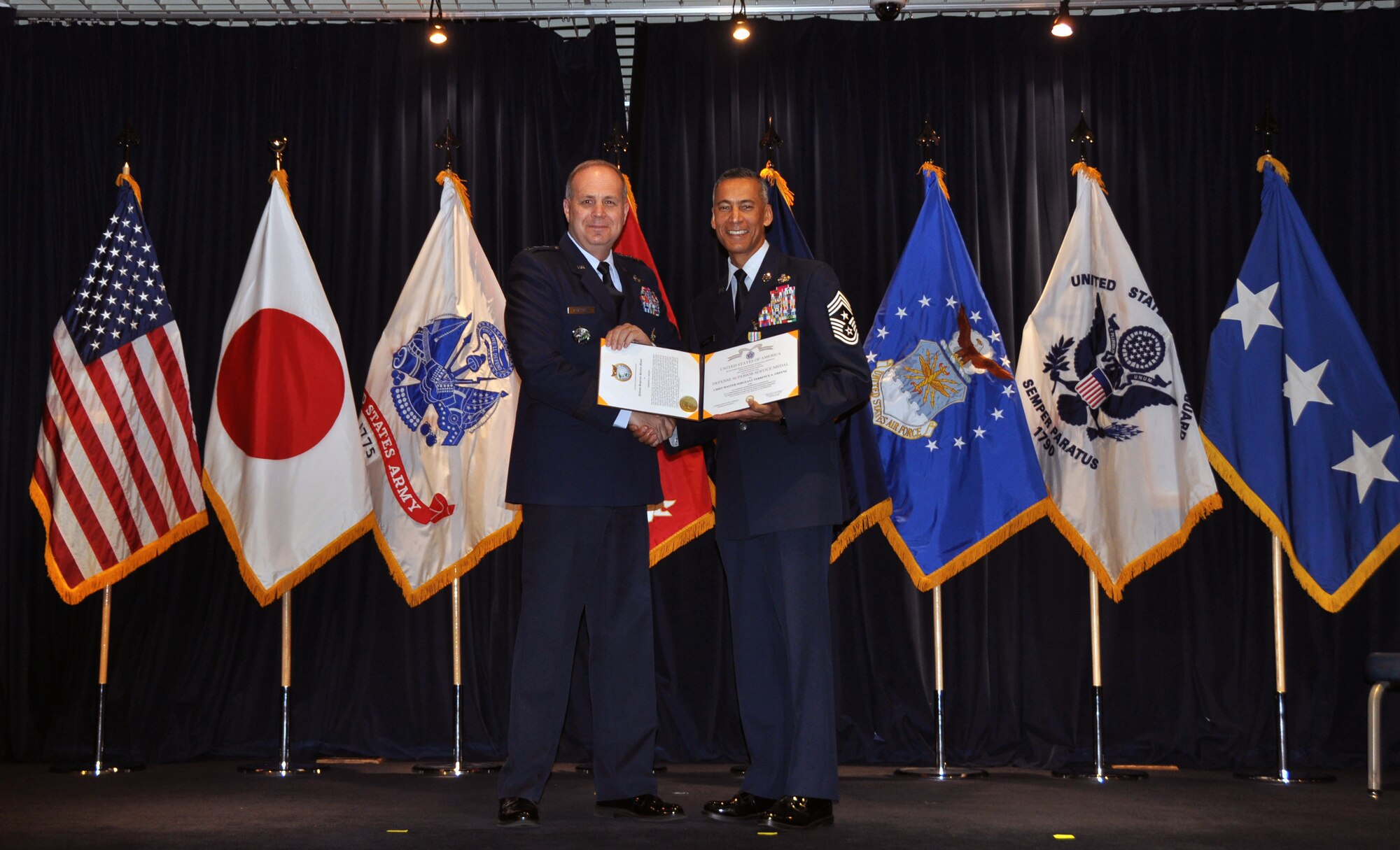 Chief Master Sgt. Terrence Greene, who served dual-hatted as the USFJ Senior Enlisted Leader and 5th Air Force Command Chief, relinquished his responsibilities to Chief Master Sgt. Richard Winegardner Jr., who will serve as the USFJ SEL, and Chief Master Sgt. Brian Kruzelnick, who will serve as the 5th AF Command Chief.