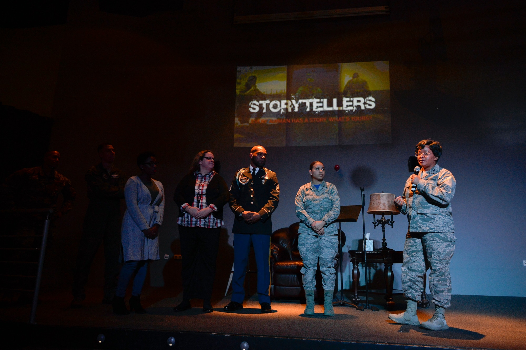 U.S. Air Force Col. Donnette Boyd, right, wing chaplain for the 86th Airlift Wing thanks six Kaiserslautern Military Community members for sharing their resilience stories during a Storytellers event on Ramstein Air Base, Germany, Nov. 16, 2018. Storytellers started at Incirlik Air Base, Turkey, in 2012 to support, aid, and promote understanding for Airmen enduring distressing events. (U.S. Air Force photo by Staff Sgt. Nesha Humes Stanton)