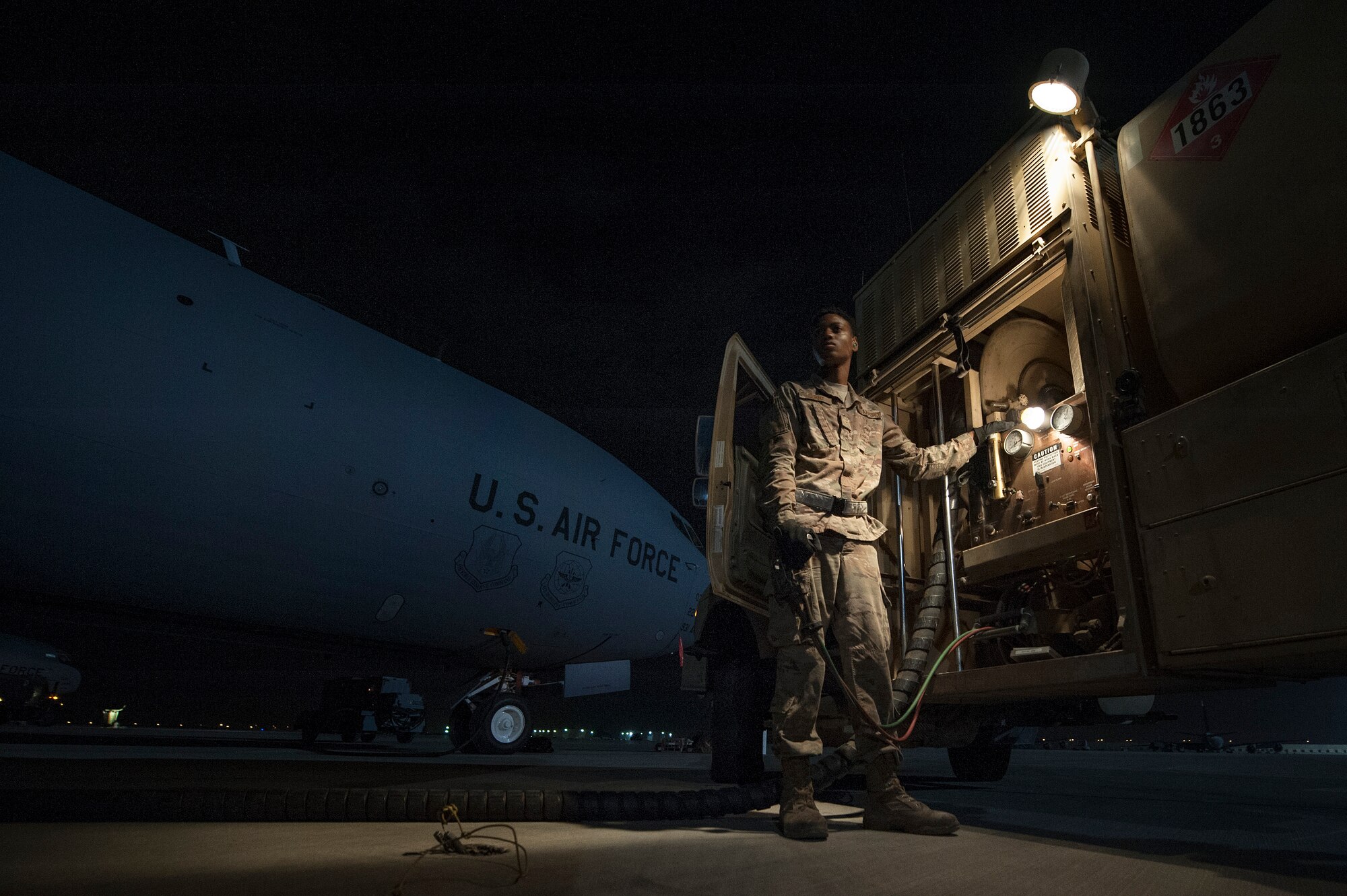 Airman 1st Class Christen Curry, 379th Expeditionary Logistics Readiness Squadron fuels distribution operator, refuels a KC-135 Stratotanker Nov. 28, 2018, at Al Udeid Air Base, Qatar.