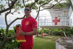Senior Airman Casey Whitworth, a full-time lifeguard and triage response team member of the Hawaii Air National Guard, was posted near this spot at Marine Corpse Base Hawaii when he was called to help rescue the victims of a commercial helicopter crash on Oct. 22, 2018. The rescue effort was successful because of the teamwork of his teammates, local firefighters and a few good Samaritans. Whitworth is a member of the 154th Medical Group’s Chemical, Biological, Radiological, Nuclear, High Yield Explosive Enhanced Response Force Package (CERFP), a unit that responds to emergencies on a regular basis. Whitworth attributes some of his preparedness to his training in the HIANG. This photo was taken on Nov. 22, 2018.