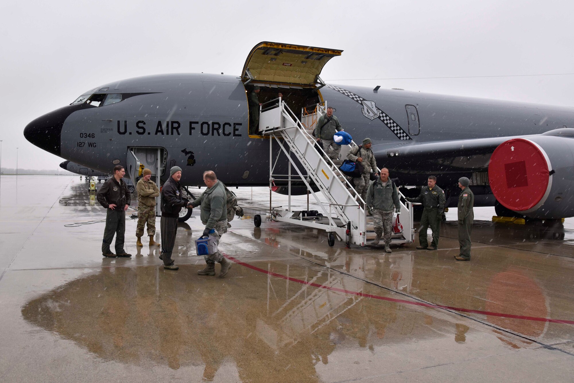 Citizen-Airmen of the Michigan Air National Guard disembark from a KC-135 Stratotanker at Selfridge Air National Guard Base, Mich., Nov. 9, 2018.