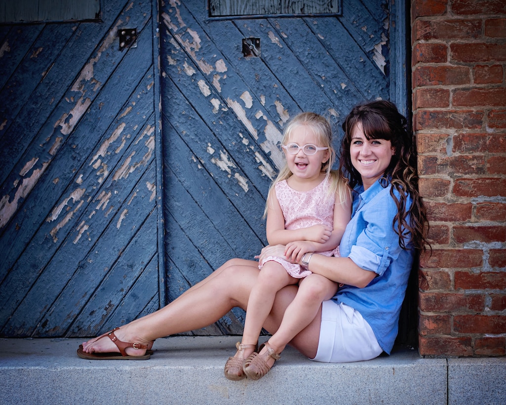 U.S. Air Force Staff Sgt. Amanda Scheer, 60th Contracting Squadron contracting specialist, and her daughter, Paisley, pose for a photo in Vallejo, California., Aug. 20, 2017. Scheer is a single mother and has served in the Air Force for six years. (Courtesy photo by Valerie Ozella)