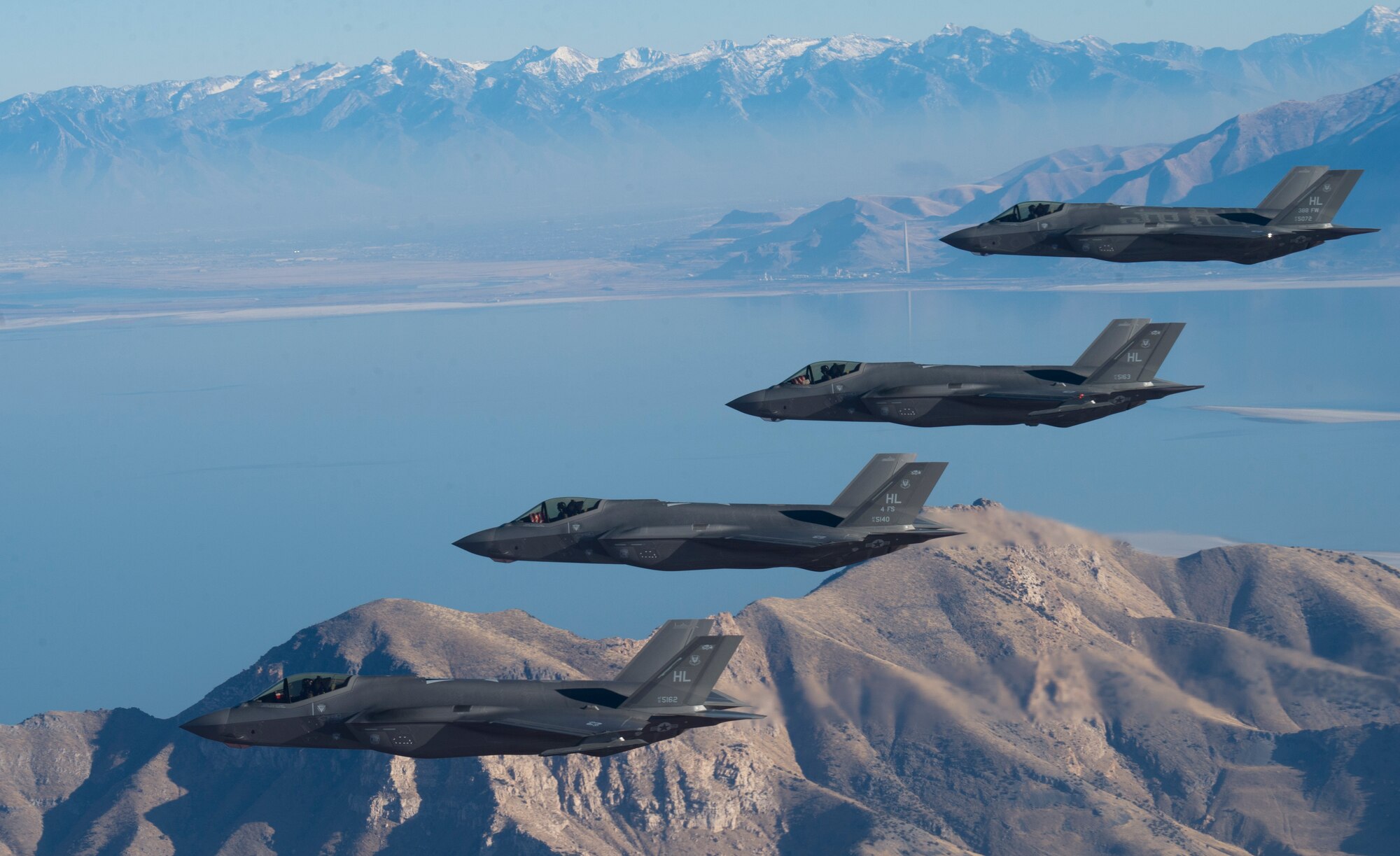A formation of F-35 Lightning IIs from the 388th and 419th Fighter Wings stationed at Hill Air Force Base perform aerial maneuvers during a combat power exercise over Utah Test and Training Range, Nov. 19, 2018.