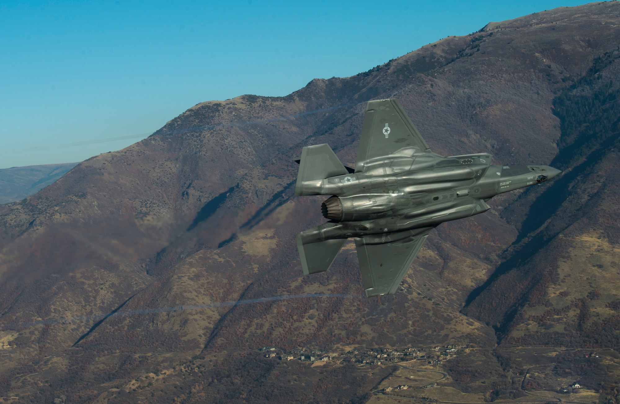 An F-35 Lightning II stationed at Hill Air Force Base performs aerial maneuvers during a combat power exercise over Hill Air Force Base, Nov. 19, 2018.