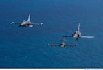 Maj. Thomas Werner, a 149th Fighter Wing F-16 pilot, Air National Guard, flies in an international aircraft formation Nov. 20