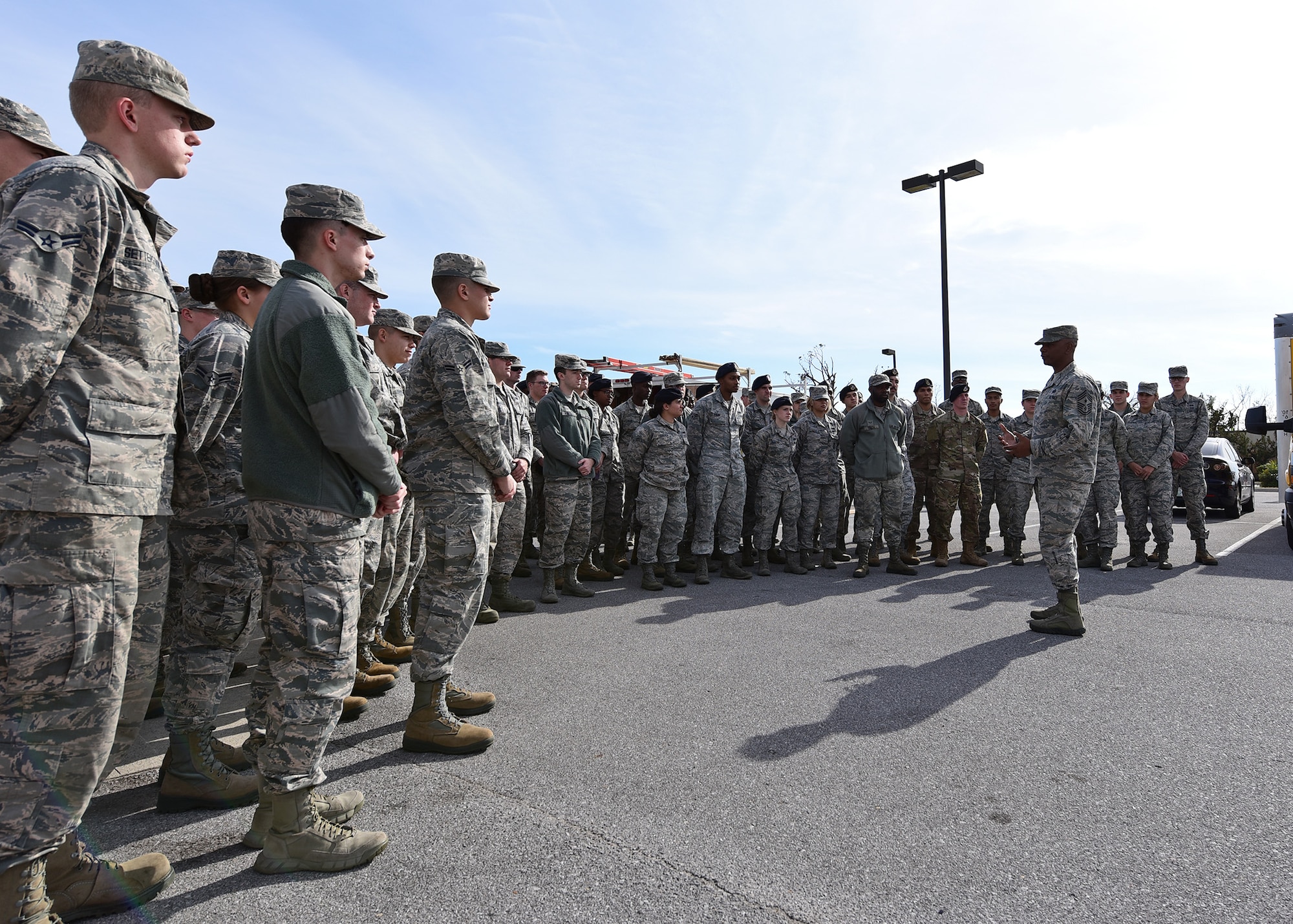 Chief Master Sgt. Craig Williams, 325th Fighter Wing command chief, speaks to members of Task Force Talon II at Tyndall Air Force Base, Fla., Nov. 28, 2018. Task Force Talon II is tasked with clearing and cleaning various parts of Tyndall to include the dormitories. Select dormitories will be used to house permanent party Airmen who return to Tyndall. (U.S. Air Force photo by Senior Airman Isaiah J. Soliz)