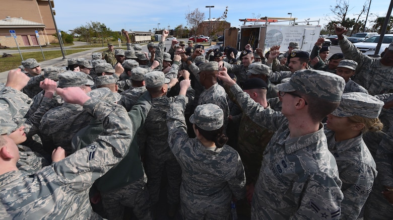 Task Force Talon II Airmen rally around Chief Master Sgt. Craig Williams, 325th Fighter Wing command chief, at Tyndall Air Force Base, Fla., Nov. 28, 2018. Williams spoke to his fellow Airmen on the state of Tyndall now and in the future. Task Force Talon II Airmen are responsible for clearing debris from various parts of Tyndall. (U.S. Air Force photo by Senior Airman Isaiah J. Soliz)