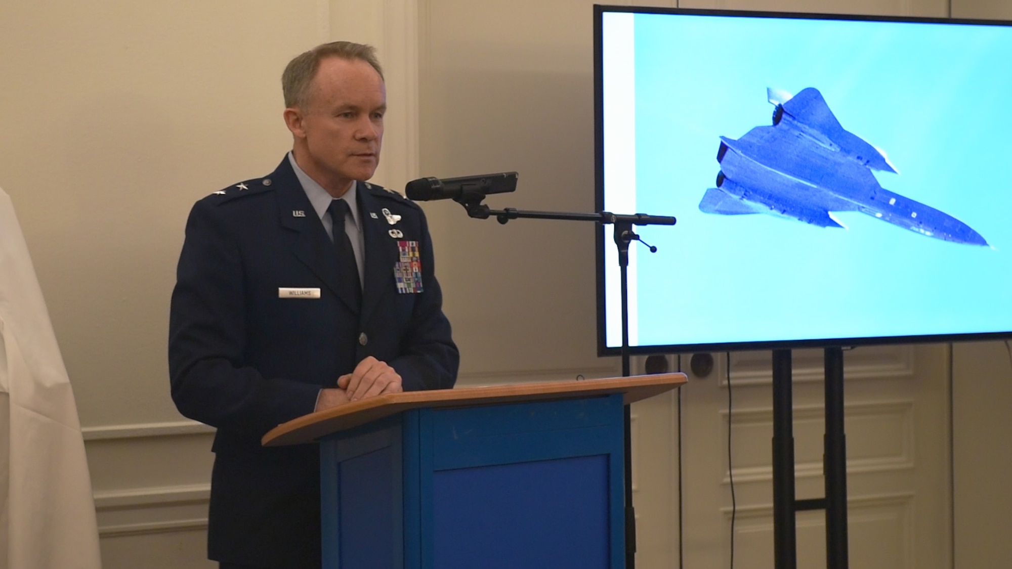 U.S. Air Force Maj. Gen. John Williams, Mobilization Assistant to the commander, U.S. Air Forces in Europe and Africa, talks about the Swedish pilots who are being awarded the U.S. Air Medal in Stockholm, Sweden, Nov. 28, 2018. Gen. Williams thanked the four Swedish Airmen who risked their lives to save an SR-71 and the aircrew in 1987. (U.S. Air Force Photo by Senior Airman Kelly O'Connor)