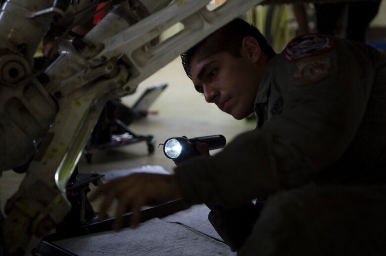 The landing gear of an F-16 must be checked frequently to make sure it is in top shape.