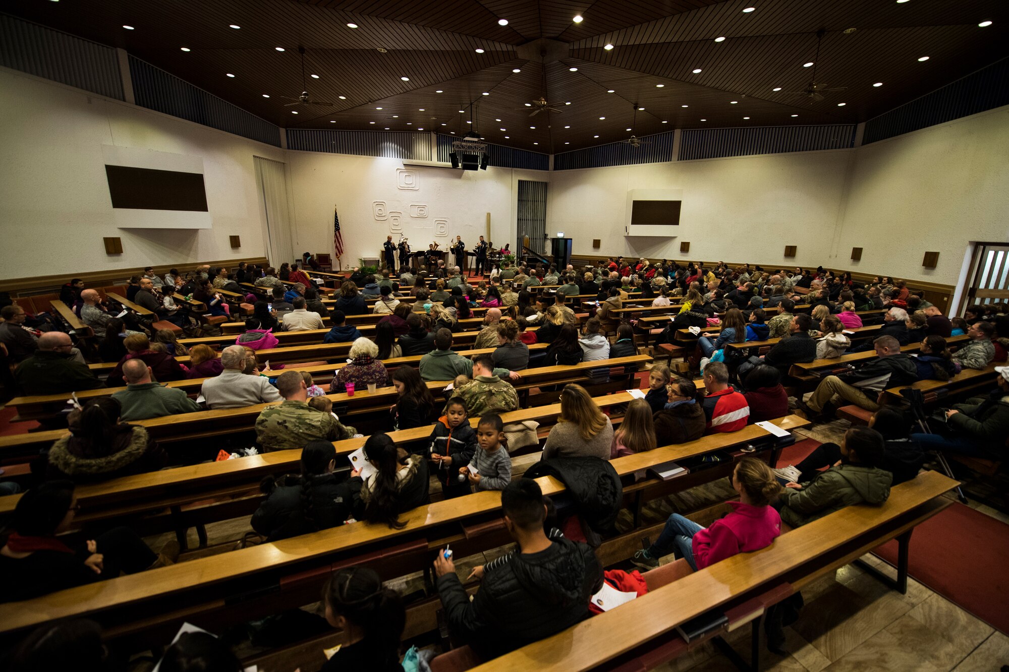 Members of the Kaiserslautern Military Community attend Ramstein’s annual Christmas Tree Lighting Ceremony on Ramstein Air Base, Germany, Nov. 27, 2018. The ceremony began with a service held in the base chapel. (U.S. Air Force photo by Senior Airman Devin M. Rumbaugh)