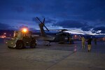 Airmen of the 176th Wing launch a 210th Rescue Squadron HH-60G Pave Hawk Nov. 27, 2018, at Joint Base Elmendorf-Richardson, Alaska. The HH-60 pictured here was recalled when pararescuemen of the 212th Rescue Squadron earlier deployed with another HH-60 crew and rescued a pilot and a passenger of a Cessna 172 that crashed on Montague Island.