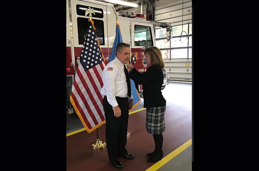 Rick Ferrell with wife at promotion ceremony