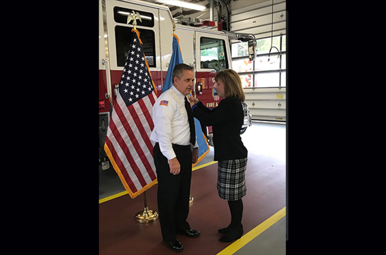 Rick Ferrell with wife at promotion ceremony
