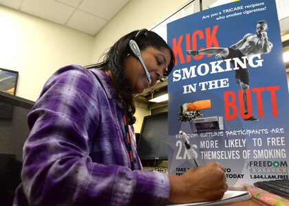 Karen LeRoy, research director for the University of Virginia’s research team at Wilford Hall Ambulatory Medical Center on Joint Base San Antonio-Lackland, speaks with a caller on the Freedom Quit Line. The quit line is a resource for Tricare beneficiaries, which is located at WHASC under at Cooperative Research and Development Agreement between the Air Force and the University of Virginia, for cigarette smokers worldwide who are looking for a way to quit smoking and is available at 1-844-I-AM-FREE (1-844-426-3733).

(U.S. Air Force Photo by Daniel J. Calderón)