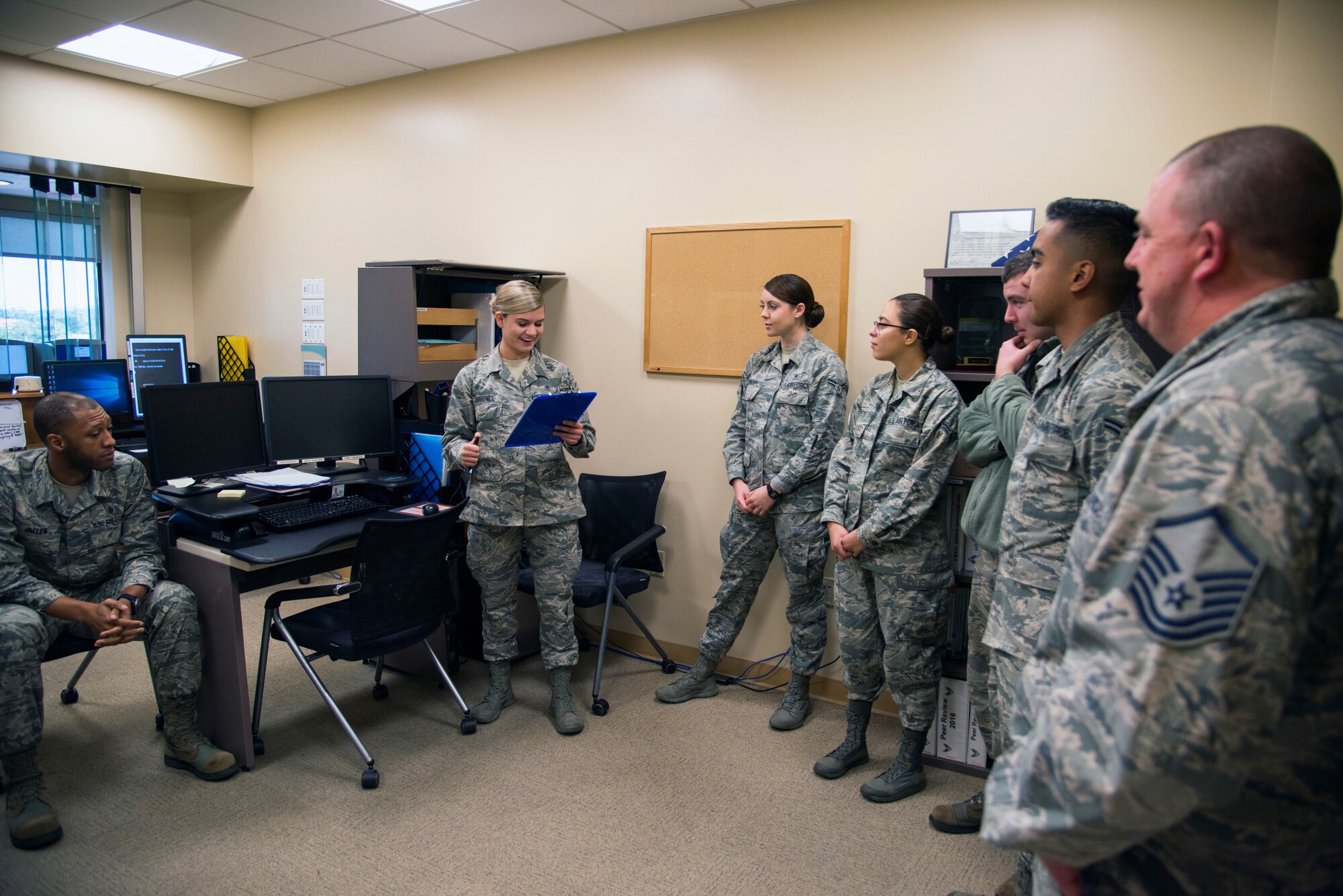 U.S. Air Force Senior Airman Amber Durrence, second from left, a 6th Medical Operations Squadron mental health technician, leads a mental health morning meeting at MacDill Air Force Base, Fla., Nov. 29, 2018.