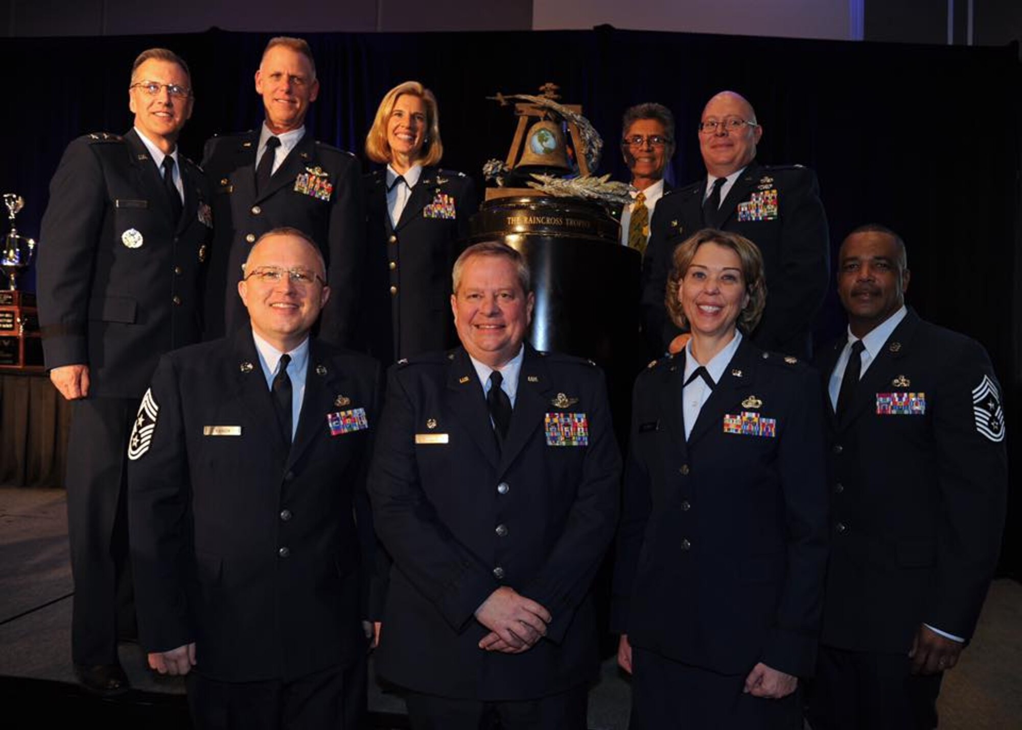Maj. Gen. Randall Ogden, 4th Air Force commander, and Col. Larry Shaw, 434th Air Refueling Wing commander, along with command staff from Grissom Air Reserve Base, pose with the Raincross Trophy at March Air Reserve Base, Nov. 21, 2018. The 434th ARW was awarded the Raincross Trophy for distinguishing itself as the best unit in 4th Air Force between Oct. 2017 and Sept. 2018. (U.S. Air Force photo)