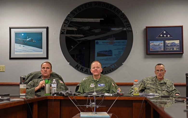 (From left) U.S. Air Force Col. Johan Deutscher, 141st Air Refueling Wing commander, Col. Derek Salmi, 92nd ARW commander, and Chief Master Sgt. Lee Mills, 92nd ARW command chief, listen to a briefing from System Program Office during a site visit to Tinker Air Force Base, Oklahoma, Nov. 19, 2018. All Fairchild aircraft are scheduled to depot at Tinker AFB every five years which is coordinated through Major Commands and Tinker’s System Program Office. (U.S. Air Force photo by Airman 1st Class Jesenia Landaverde)