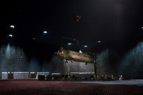 A Royal Canadian Air Force CH-147F Chinook is rolled into the Benefield Anechoic Facility Sept. 24. The BAF, operated by the 772nd Test Squadron, is the largest anechoic chamber in the world and can fit any aircraft inside. The chamber is filled with polyurethane and polyethylene pyramids designed to stop reflections of electromagnetic waves. The size of the pyramids, which are painted dark blue or black, varies depending on the particular frequency and test procedure being conducted. Aircraft systems can be tested and verified that they work properly prior to actual flight test. (U.S. Air Force photo by Kyle Larson)