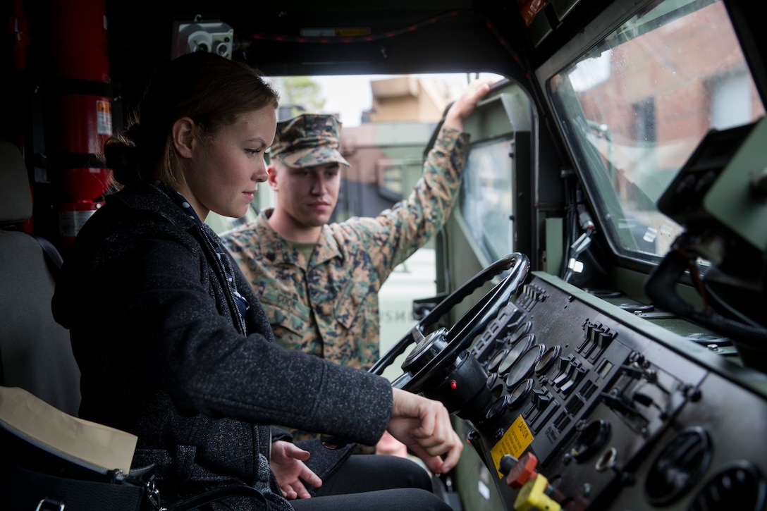 Kristen Johnson, military legislative assistant to Senator Tom Cotton of Arkansas, receives a tour of a Medium Tactical Vehicle Replacement at Camp Lejeune, N.C., Nov. 26, 2018. Johnson traveled to Camp Lejeune to observe different elements of the Marine Air-Ground Task Force’s expeditionary capabilities and to become familiar with the structure of the United States Marine Corps. (U.S. Marine Corps Photo by Cpl. Taylor W. Cooper)