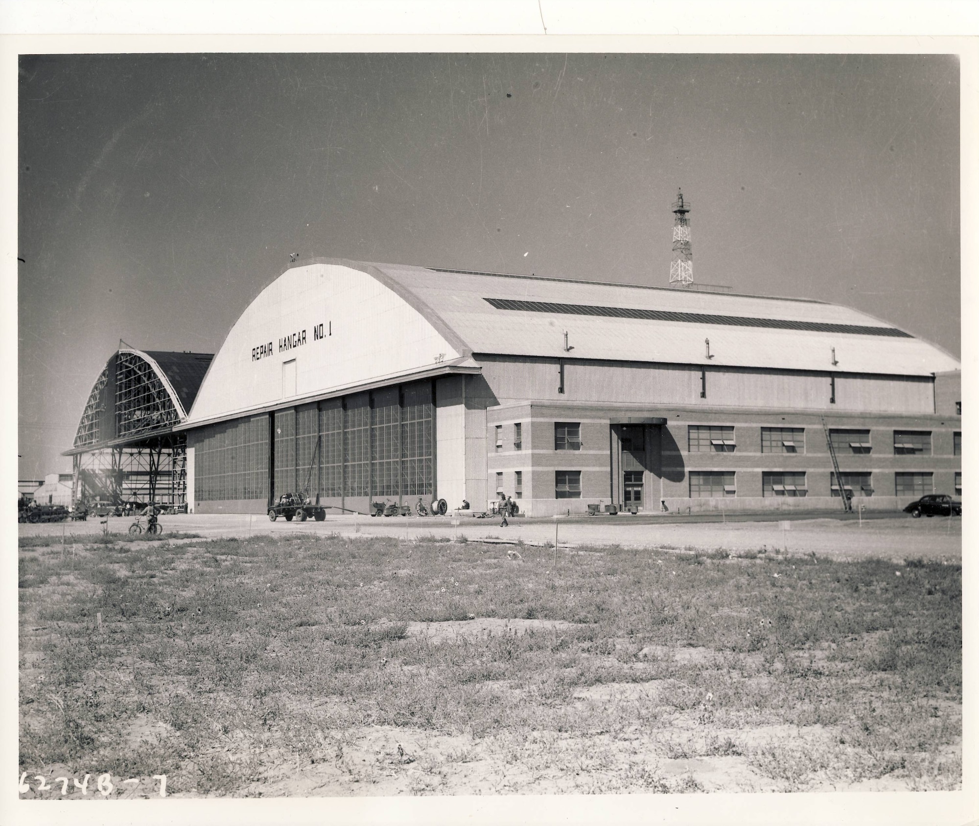 Construction of Hangar 225 at Hill Air Force Base, Utah. The 76-year-old structure was built during World War II and is scheduled to undergo an estimated $40 million, six-year renovation project that will repair and replace a deteriorating roof on the nearly 13-acre building. The 309th Aircraft Maintenance Group currently uses the hangar for upgrade, maintenance and repair work on multiple aircraft. (U.S. Air Force)