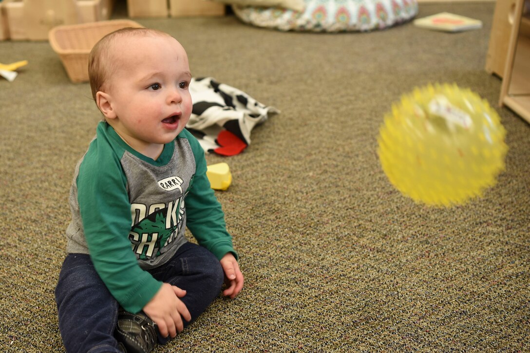 Gunner Sparks, 1, plays with new toys provided by the Child Development Center November 27, 2017, on Grand Forks Air Force Base, North Dakota. The CDC purchased an abundance of toys for each classroom so there are always enough toys for each child. (U.S. Air Force photo by Airman 1st Class Melody Wolff)
