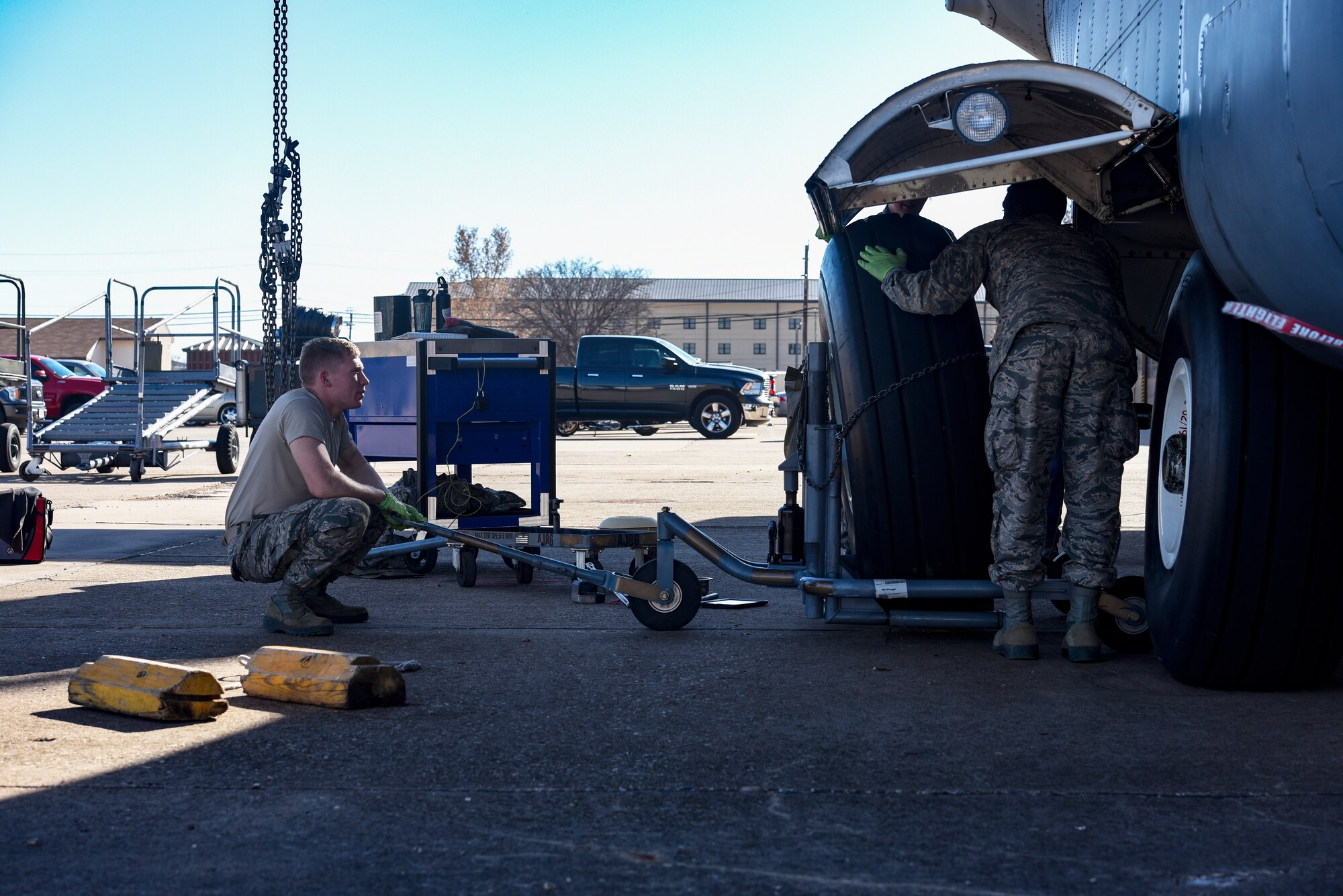 Sheppard Airman remove a tire