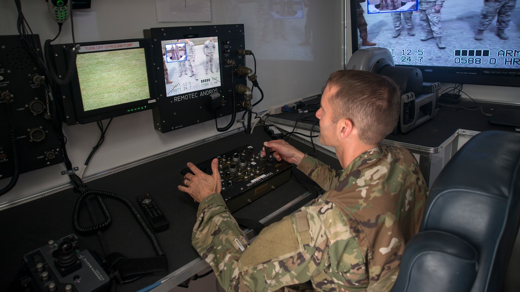 U.S. Air Force Col. Stephen Snelson, 6th Air Mobility Wing Commander, operates a remote control explosive ordnance disposal robot at MacDill Air Force Base, Fla., Nov. 26, 2018.