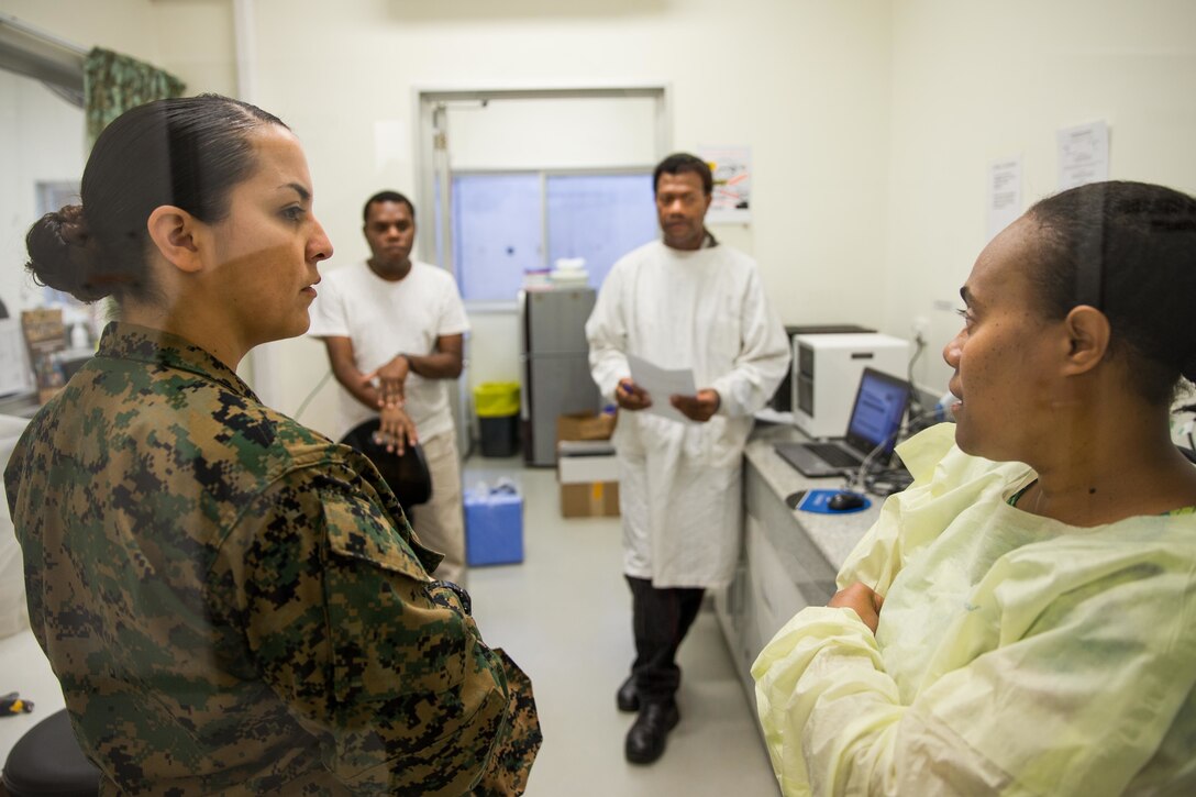 U.S. Navy Hospital Corpsman 2nd Class Desirae A. Montoya, left, with Task Force Koa Moana, speaks with hospital staff during a survey at Central Hospital, Port Vila, Efate Island, Republic of Vanuatu, Nov. 15, 2018. The Task Force met with hospital staff and toured the facility to learn about its medical capabilities and humanitarian assistance and disaster and relief procedures in case of a crises, as part of the Task Force’s continued multilateral engagements designed to strengthen and enhance relationships among the United States and partner nations in the Indo-Pacific and South Pacific regions. (U.S. Marine Corps photo by Staff Sgt. Gabriela Garcia)