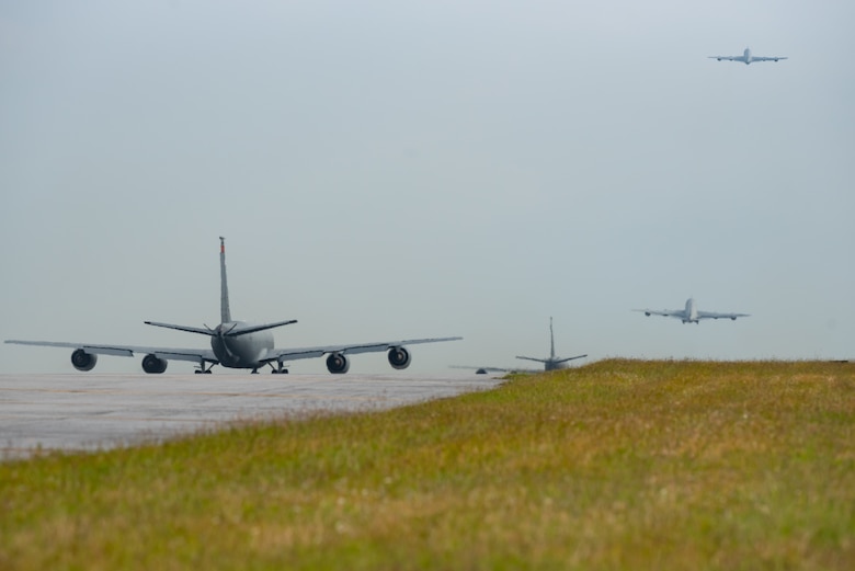 A four-ship of KC-135 Stratotankers from the 909th Air Refueling Squadron depart Kadena Air Base, Japan, Nov. 2, 2018, during exercise Steel Tiger. The aircrew used one runway to conduct minimum interval take-offs between departures. The 909th ARS is the first KC-135 unit in the Pacific Air Forces to train on this procedure. (U.S. Air Force photo by Staff Sgt. Micaiah Anthony)