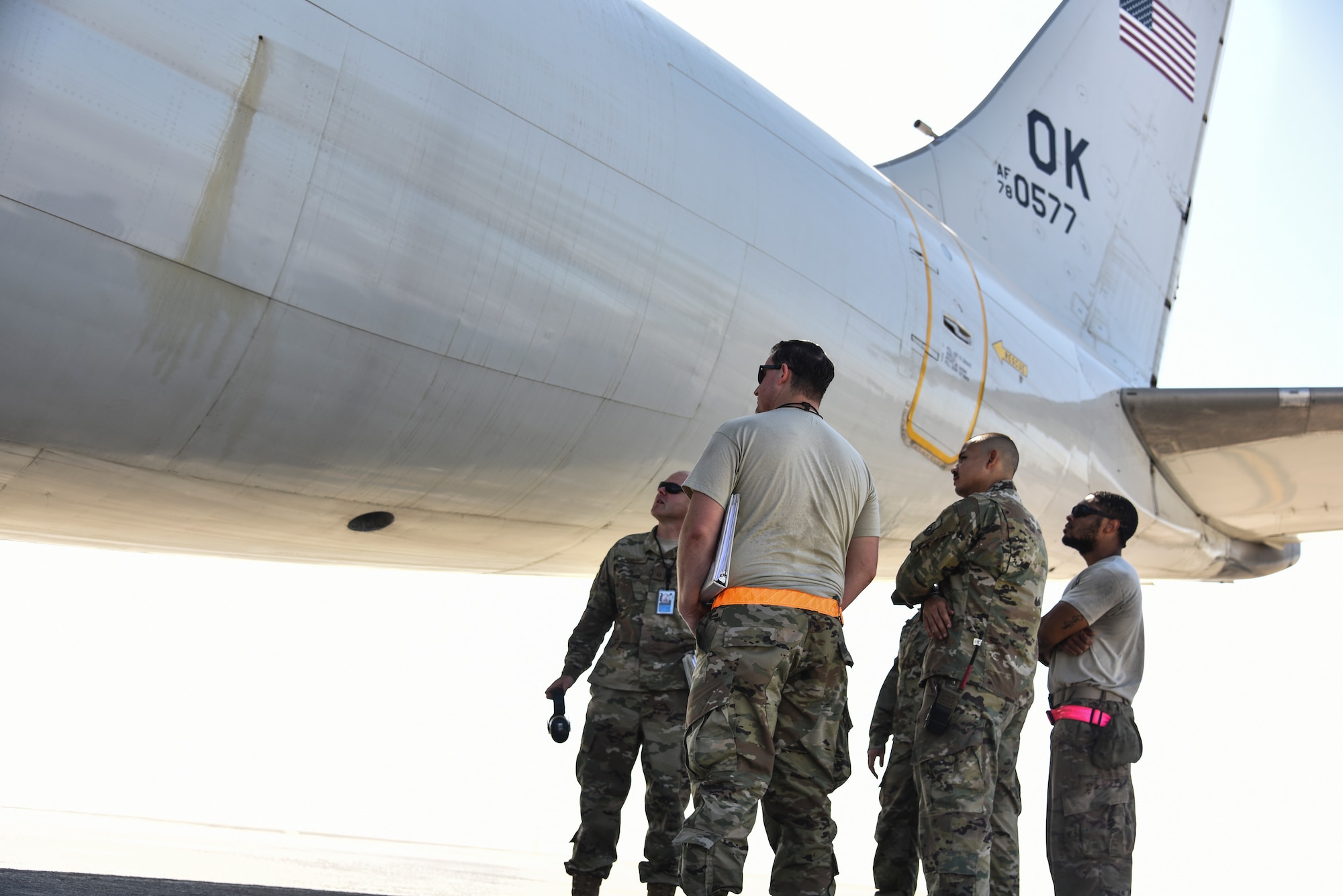 380th Expeditionary Maintenance Group Crash Damaged or Disabled Aircraft Recovery team members participate in familiarization training on an E-3 Sentry AWACS at Al Dhafra Air Base, United Arab Emirates, Nov. 14, 2018. The CDDAR team is not only responsible for responding to the aircraft assigned to ADAB, but all aircraft in the U.S. Air Forces Central Command area of responsibility. The AFCENT AOR ranges from the top of Uzbekistan near the Aral Sea, all the way to the southern tip of Yemen – spanning across 20 Central and Southwest Asian countries. (U.S. Air Force photo by Senior Airman Mya M. Crosby)