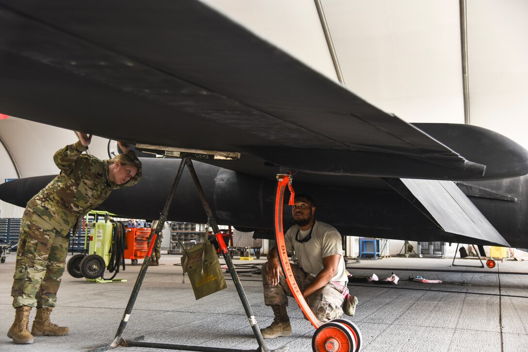 U.S. Air Force Staff Sgts. Jessica Reynolds, 380th Expeditionary Aircraft Maintenance Squadron E-3A aircraft repair mechanic, and Joshua Brown, 380th EAMXS U-2 Dragon Lady aircraft repair mechanic, explore a U-2 during familiarization training at Al Dhafra Air Base, United Arab Emirates, Nov. 14, 2018. The CDDAR team is not only responsible for responding to the aircraft assigned to ADAB, but all aircraft in the U.S. Air Forces Central Command area of responsibility. The AFCENT AOR ranges from the top of Uzbekistan near the Aral Sea, all the way to the southern tip of Yemen – spanning across 20 Central and Southwest Asian countries. (U.S. Air Force photo by Senior Airman Mya M. Crosby)