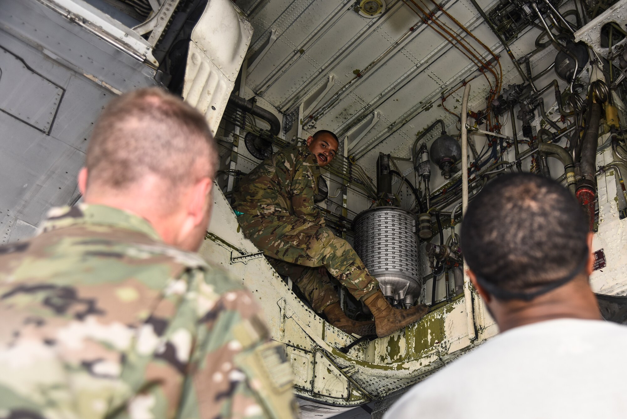 U.S. Air Force Senior Airman Brandon Thomas, 380th Expeditionary Aircraft Maintenance Squadron KC-10 Extender aircraft repair mechanic and Crash Damaged or Disabled Aircraft Recovery team member, conducts familiarization training on a KC-10 at Al Dhafra Air Base, United Arab Emirates, Nov. 21, 2018. The CDDAR team is not only responsible for responding to the aircraft assigned to ADAB, but all aircraft in the U.S. Air Forces Central Command area of responsibility. The AFCENT AOR ranges from the top of Uzbekistan near the Aral Sea, all the way to the southern tip of Yemen – spanning across 20 Central and Southwest Asian countries. (U.S. Air Force photo by Senior Airman Mya M. Crosby)