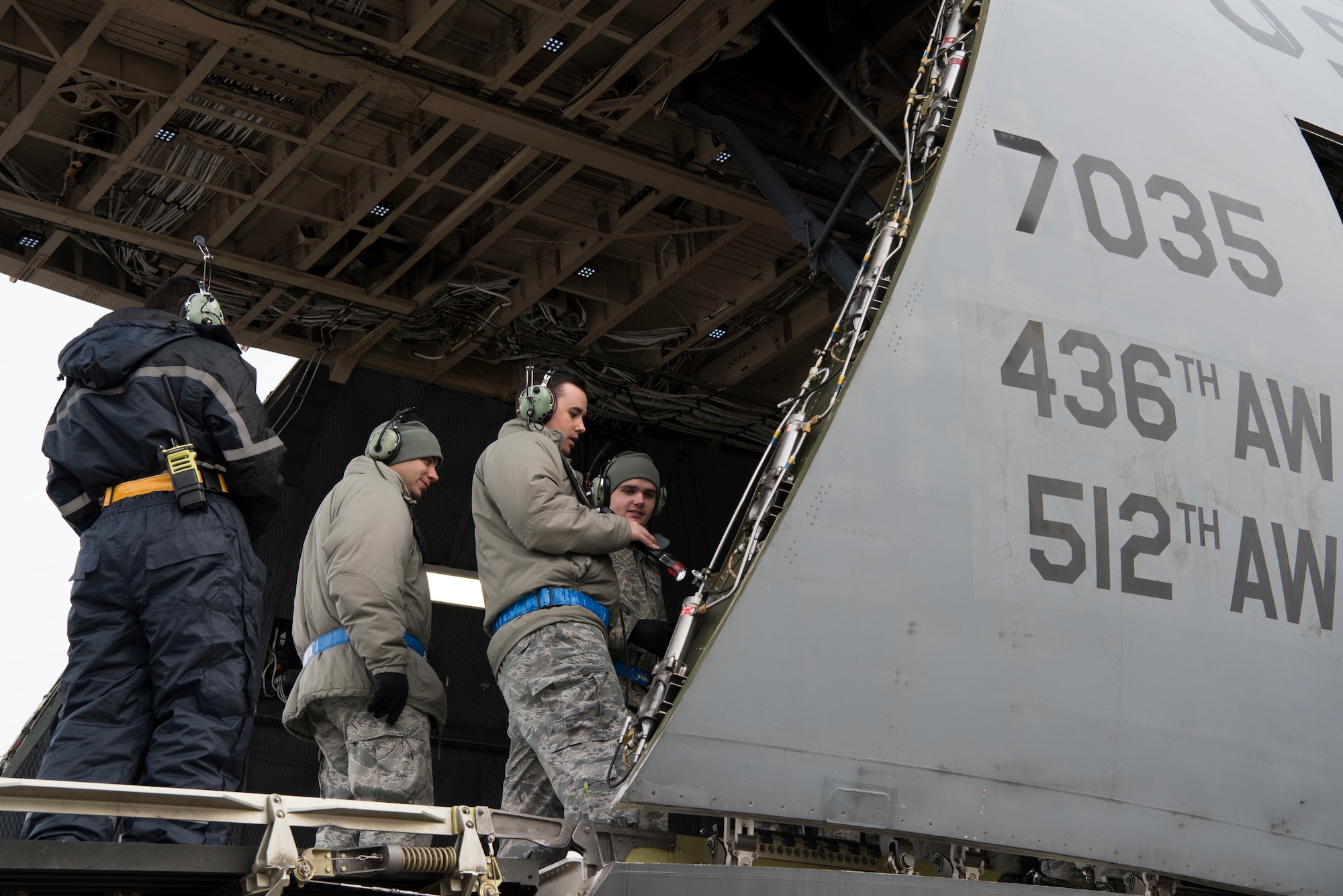 Staff Sgt. Ryan Johnson (front right), 521st Air Mobility Operations Wing regional training center crew chief instructor, shows students what they need to inspect aboard a C-5M Super Galaxy aircraft at Ramstein Air Base, Germany, Nov. 29, 2018. The 521st AMOW’s mission, to “expedite global reach to professionally answer our Nation’s call,” relies heavily on skilled aircraft maintainers who ensure transient aircraft get the maintenance they need en route. (U.S. Air Force photo by Staff Sgt. Aaron J. Jenne)