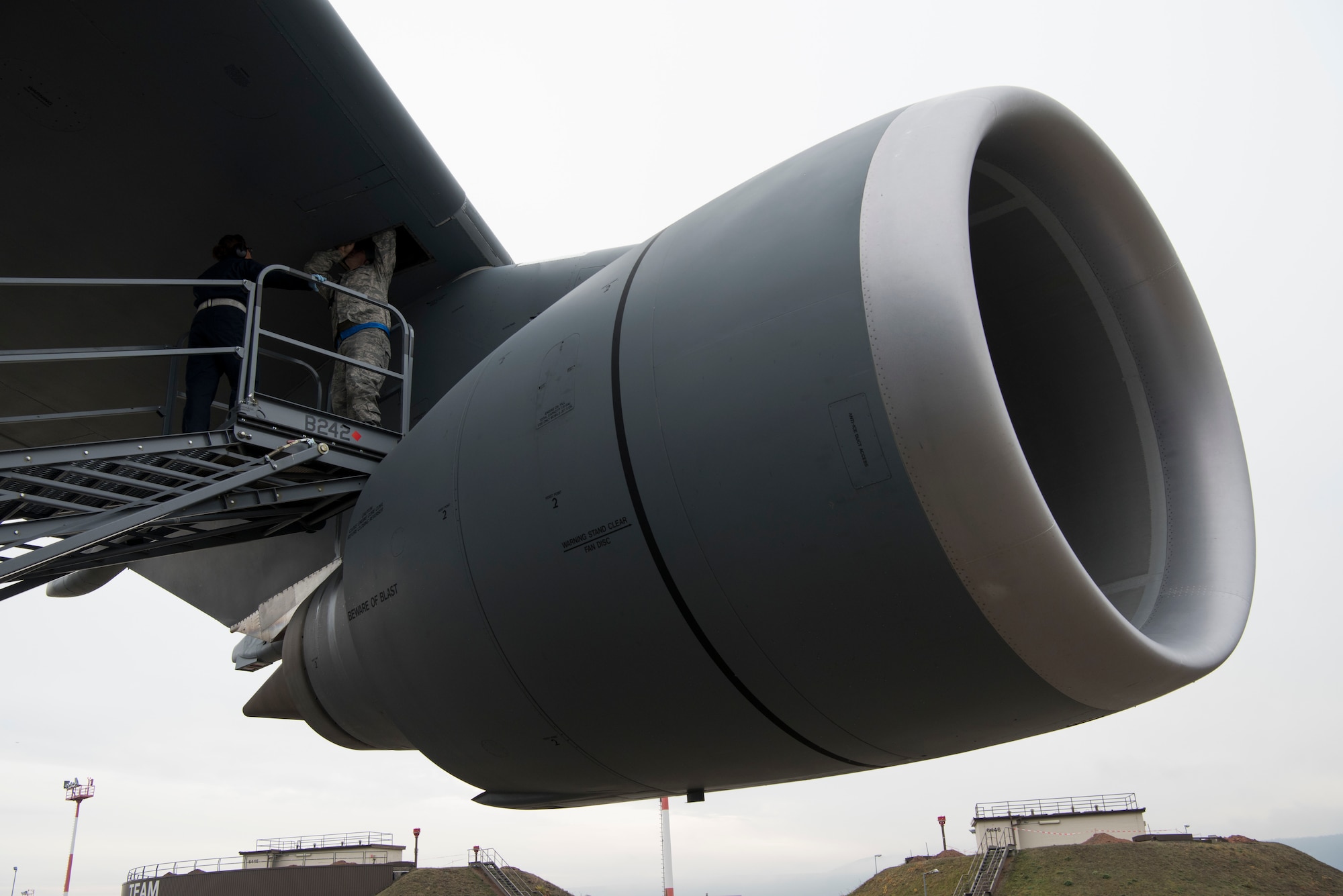 Master Sgt. Jeff Bejune, 512th Aircraft Maintenance Squadron C-17 hydraulic systems specialist, and Senior Airman Lourdes Cigarruista, 512th Maintenance Squadron C-5 hydraulic systems specialist, from Dover Air Force Base, Del., look for a hydraulic leak on a C-5M Super Galaxy at Ramstein Air Base, Germany, Nov. 29, 2018. More than 30 U.S. Air Force Reserve aircraft maintainers assigned to the 512th Airlift Wing augmented flight line maintenance operations for two weeks during a first-of-its-kind C-5 training session at Ramstein AB. (U.S. Air Force photo by Staff Sgt. Aaron J. Jenne)