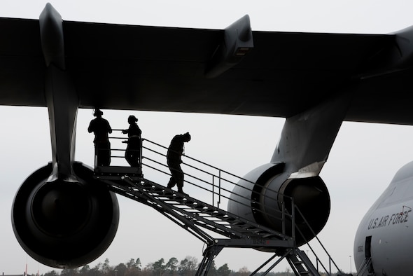 Aircraft maintainers repair a hydraulic leak on a C-5M Super Galaxy at Ramstein Air Base, Germany, Nov. 29, 2018. More than 30 U.S. Air Force Reserve aircraft maintainers augmented flight line maintenance operations for two weeks during a first-of-its-kind C-5 training session at Ramstein AB. (U.S. Air Force photo by Staff Sgt. Aaron J. Jenne)
