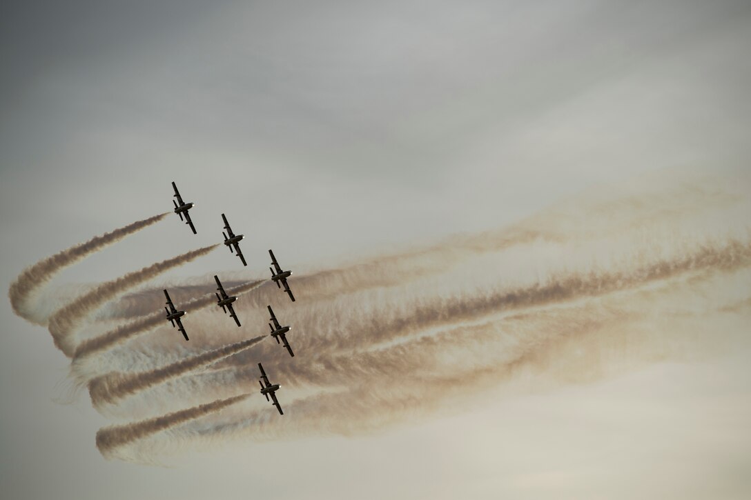 An aerial demonstration team flies over Sakhir Air Base, Bahrain