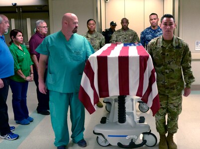 Brooke Army Medical Center staff practice the rendering of flag honors for fallen heroes in July 2018. No matter the branch, war or length of service, BAMC salutes every veteran and first responder who dies in the hospital with a flag ceremony by an Honor Guard.