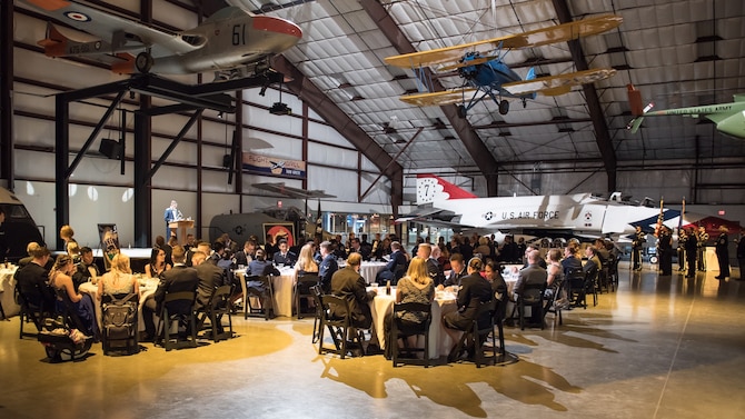 Airmen assigned to the 25th Operational Weather (OWS) Squadron at Davis-Monthan Air Force Base celebrate their squadron’s 75th anniversary at the Pima Air and Space Museum in Tuscon, Arizona, Nov. 2, 2018. The 25th OWS began as the 25th Weather Squadron Nov. 1, 1943, operating out of Patterson Field, Ohio. (U.S. Air Force photo by Airman 1st Class Isaac Teal)