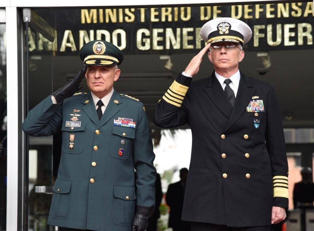 Navy. Adm. Craig S. Faller, commander of U.S. Southern Command, and Colombian Chief of Defense Alberto Jose Mejia render honors in Bogota.