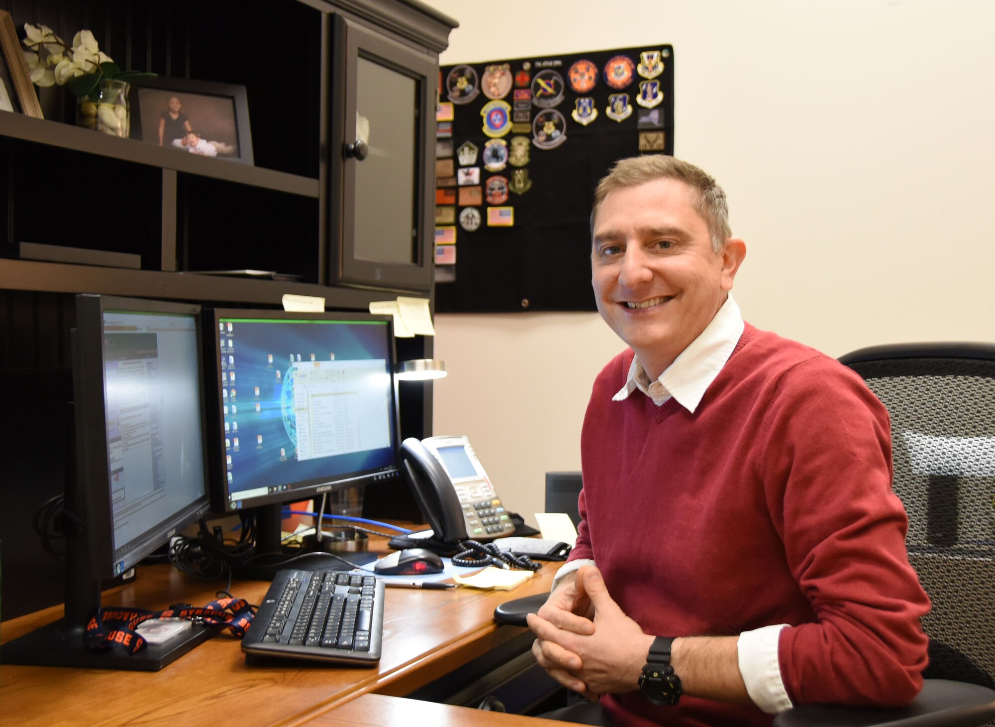 Mike Pettinelli, the director of psychological health with the 118th Wing, poses for a photo at his desk on Nov. 28, 2018 at Berry Field Air National Guard Base in Nashville, Tennessee.